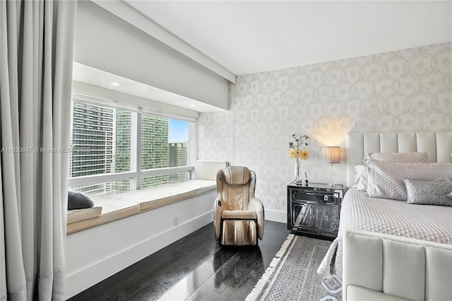 1435 Brickell Ave Unit 3512, Miami, FL 33131 - bedroom with dark wood finished floors and wallpapered walls