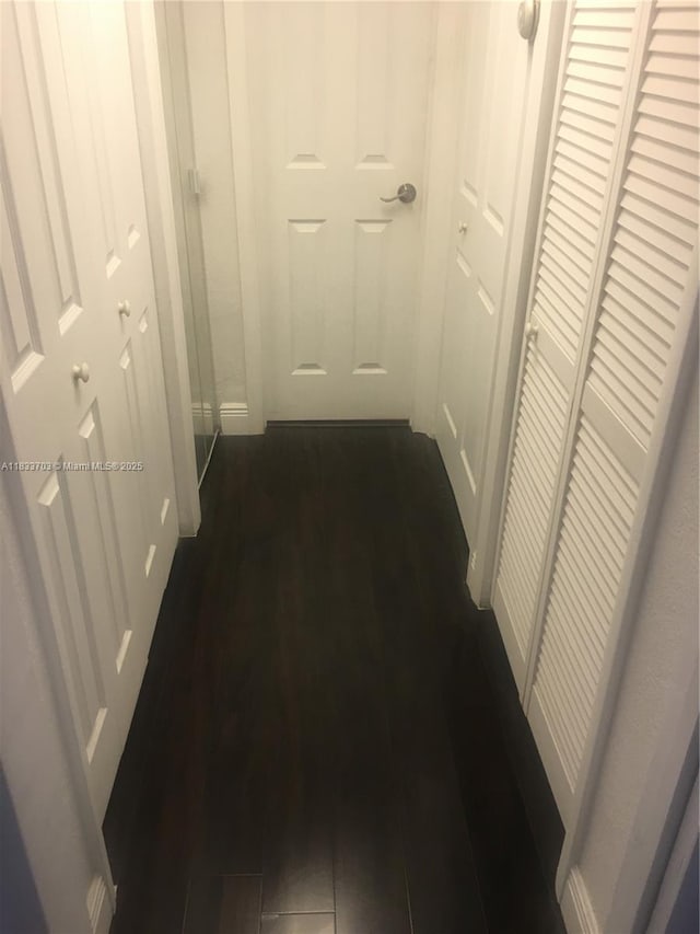 1750 NE 115th St Unit 608, Miami, FL 33181 - hall featuring dark wood-type flooring