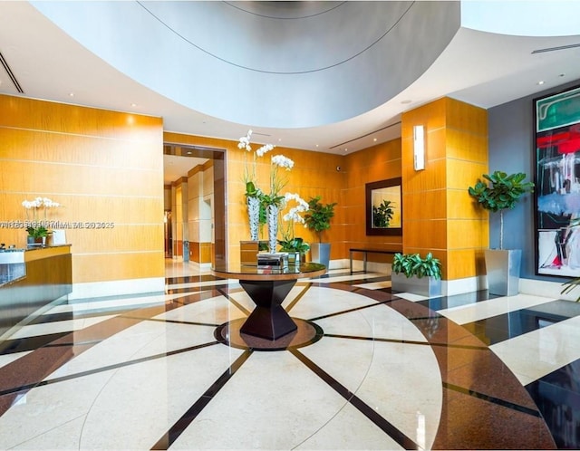 244 Biscayne Blvd Unit 440, Miami, FL 33132 - common area featuring recessed lighting, a towering ceiling, and tile walls