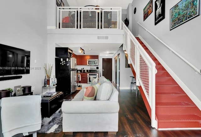 244 Biscayne Blvd Unit 440, Miami, FL 33132 - living room with dark wood finished floors and a towering ceiling