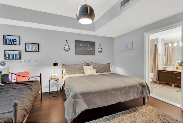 244 Biscayne Blvd Unit 440, Miami, FL 33132 - bedroom with wood finished floors and ensuite bath