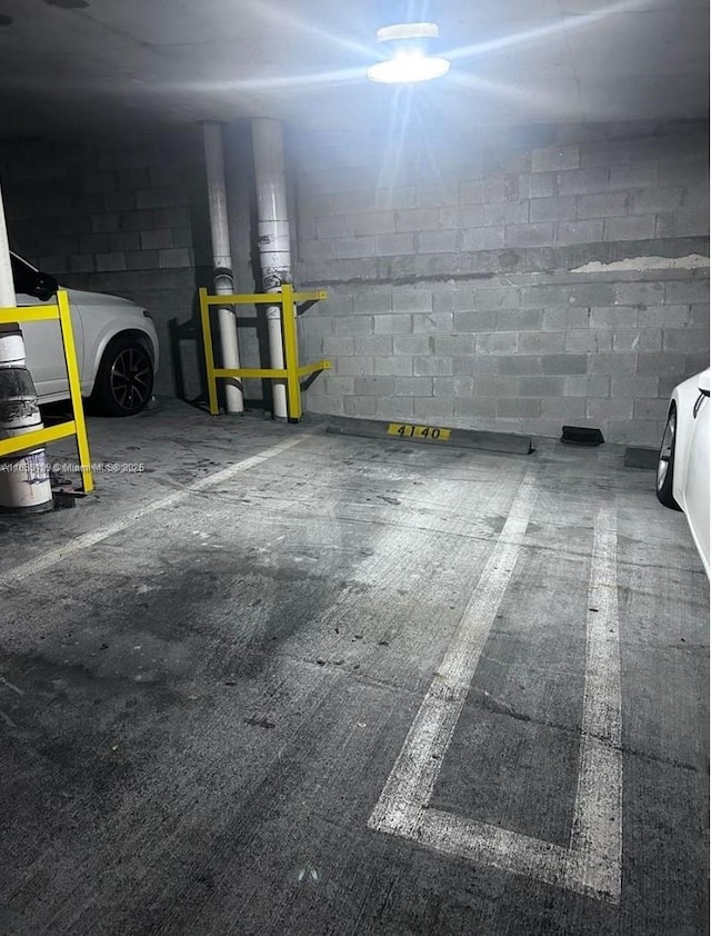 244 Biscayne Blvd Unit 440, Miami, FL 33132 - parking deck with concrete block wall