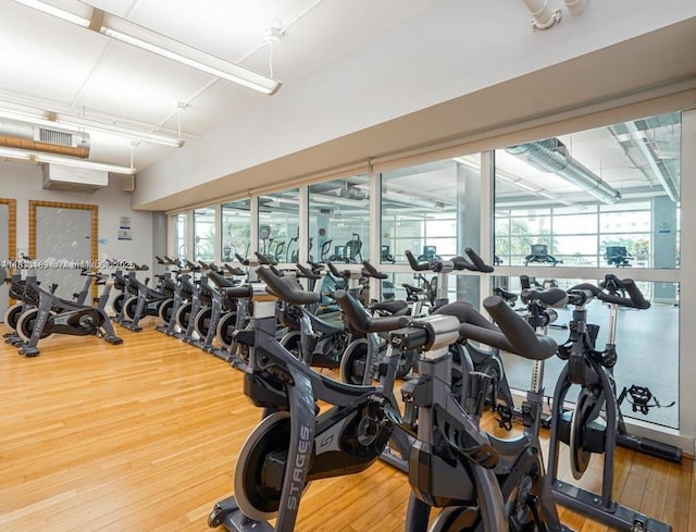 244 Biscayne Blvd Unit 440, Miami, FL 33132 - exercise room with healthy amount of natural light and wood finished floors