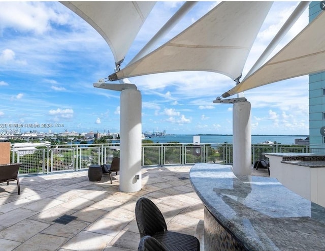244 Biscayne Blvd Unit 440, Miami, FL 33132 - view of patio / terrace with a water view