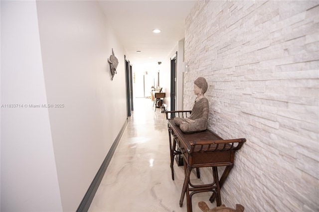 8694 Via Reale Unit 61L, Boca Raton, FL 33496 - corridor with finished concrete flooring and recessed lighting