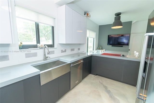 8694 Via Reale Unit 61L, Boca Raton, FL 33496 - kitchen featuring stainless steel dishwasher, gray cabinets, and modern cabinets