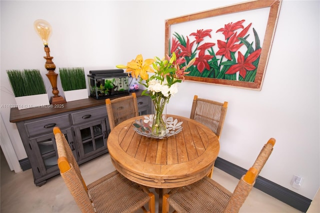 8694 Via Reale Unit 61L, Boca Raton, FL 33496 - dining room with baseboards