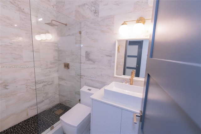 8694 Via Reale Unit 61L, Boca Raton, FL 33496 - full bath featuring a walk in shower, vanity, and tile walls