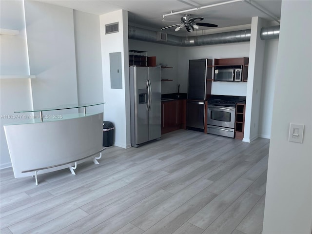 690 SW 1st Ct Unit 19, Miami, FL 33130 - kitchen featuring appliances with stainless steel finishes, electric panel, a ceiling fan, open shelves, and light wood finished floors