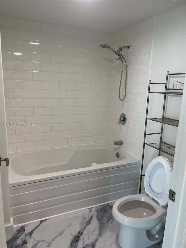 690 SW 1st Ct Unit 19, Miami, FL 33130 - bathroom with bathtub / shower combination and marble look tiles