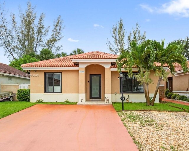 5400 NW 184th St, Miami Gardens, FL 33055 - mediterranean / spanish home with stucco siding and a tile roof