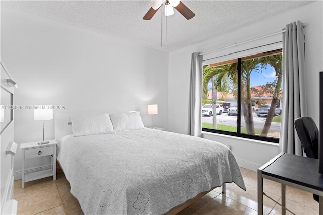 5400 NW 184th St, Miami Gardens, FL 33055 - bedroom with a textured ceiling, tile patterned floors, and a ceiling fan