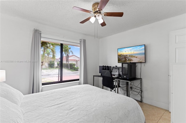 5400 NW 184th St, Miami Gardens, FL 33055 - bedroom featuring a textured ceiling, light tile patterned floors, and a ceiling fan