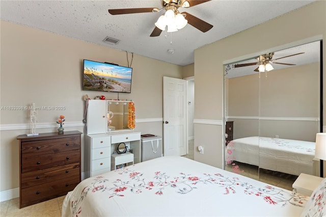 5400 NW 184th St, Miami Gardens, FL 33055 - tiled bedroom featuring a closet and ceiling fan