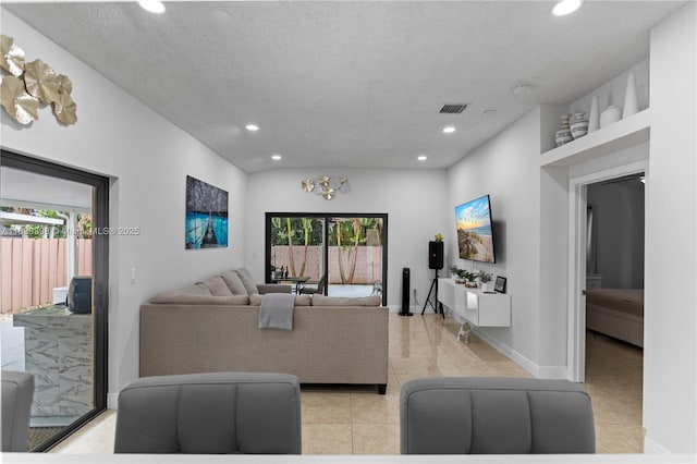 5400 NW 184th St, Miami Gardens, FL 33055 - living area with recessed lighting, healthy amount of natural light, and light tile patterned flooring