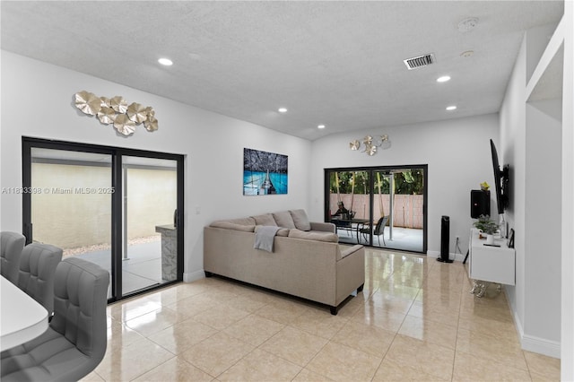5400 NW 184th St, Miami Gardens, FL 33055 - living room featuring recessed lighting and light tile patterned flooring