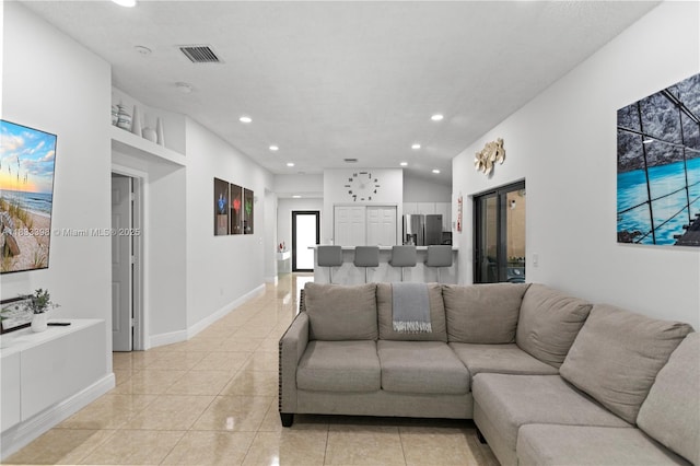 5400 NW 184th St, Miami Gardens, FL 33055 - living area featuring recessed lighting, light tile patterned flooring, and vaulted ceiling