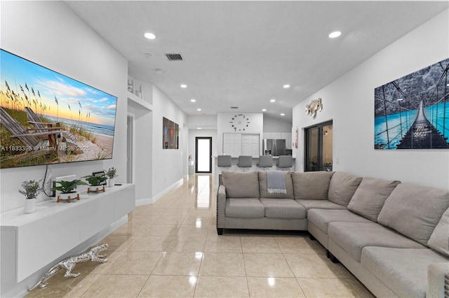 5400 NW 184th St, Miami Gardens, FL 33055 - living room featuring recessed lighting, light tile patterned floors, and vaulted ceiling