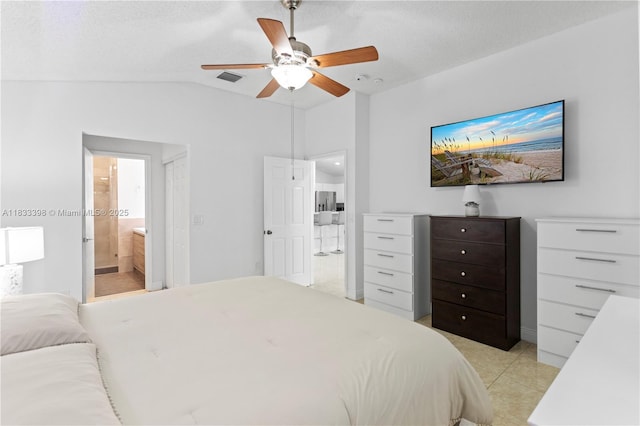 5400 NW 184th St, Miami Gardens, FL 33055 - bedroom featuring vaulted ceiling, ensuite bath, light tile patterned floors, and ceiling fan