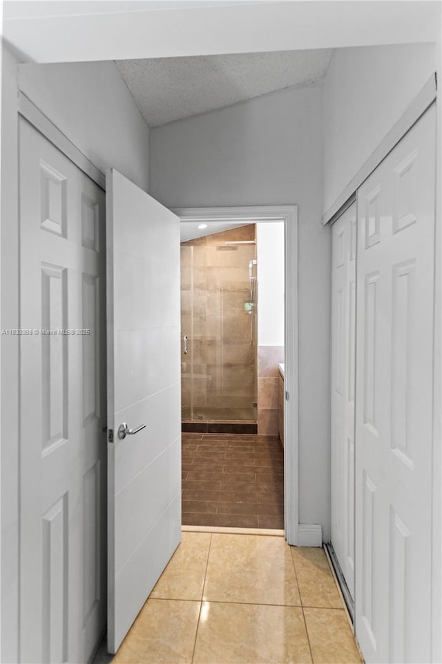 5400 NW 184th St, Miami Gardens, FL 33055 - hallway with light tile patterned floors
