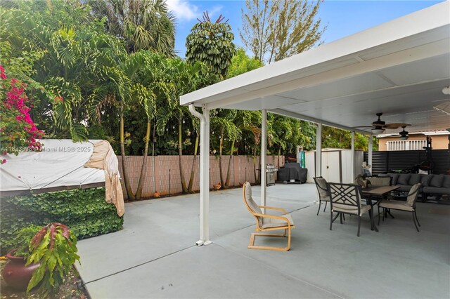 5400 NW 184th St, Miami Gardens, FL 33055 - view of patio / terrace featuring a storage shed, ceiling fan, outdoor dining area, and an outdoor living space