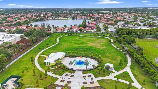 5400 NW 184th St, Miami Gardens, FL 33055 - aerial view of residential area featuring a nearby body of water and a pool