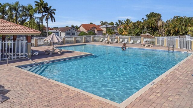 5400 NW 184th St, Miami Gardens, FL 33055 - community pool with a patio area