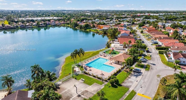 5400 NW 184th St, Miami Gardens, FL 33055 - aerial view of residential area with a pool area and a nearby body of water
