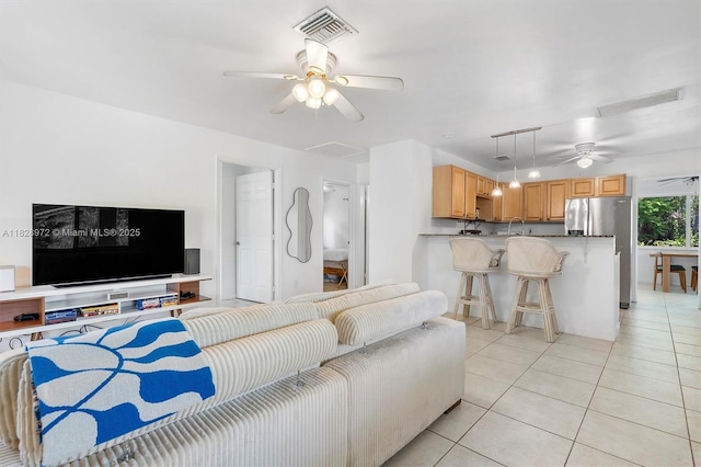 220 NW 35th Ct, Oakland Park, FL 33309 - living room featuring a ceiling fan and light tile patterned floors