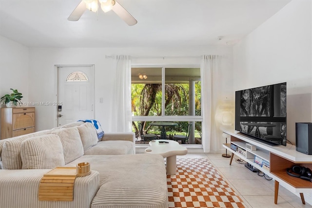 220 NW 35th Ct, Oakland Park, FL 33309 - living area featuring light tile patterned floors and ceiling fan