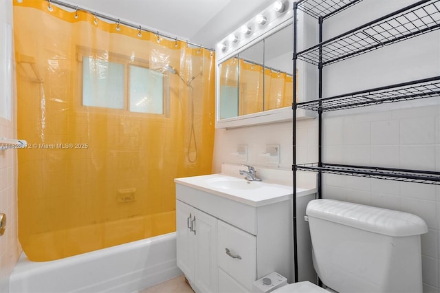220 NW 35th Ct, Oakland Park, FL 33309 - full bathroom with vanity, shower / bath combo, and tile walls