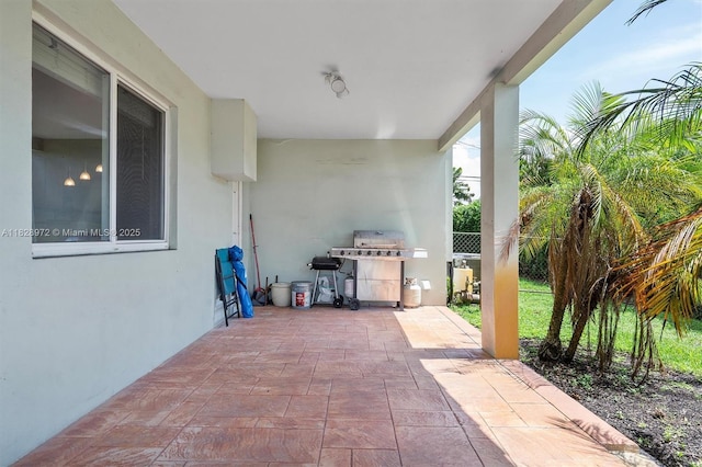 220 NW 35th Ct, Oakland Park, FL 33309 - view of patio with a grill