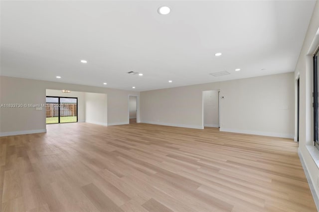 1340 SW 27th Pl, Boynton Beach, FL 33426 - empty room featuring light wood-style floors and recessed lighting