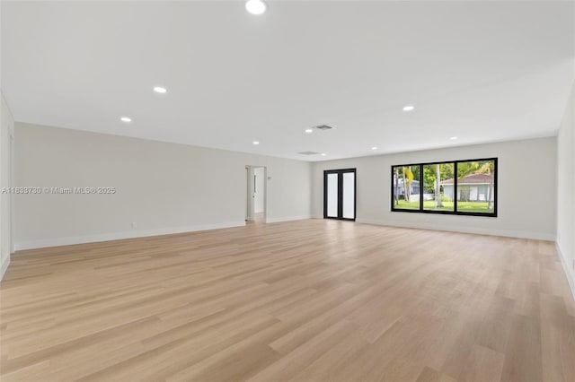 1340 SW 27th Pl, Boynton Beach, FL 33426 - empty room with light wood finished floors and recessed lighting