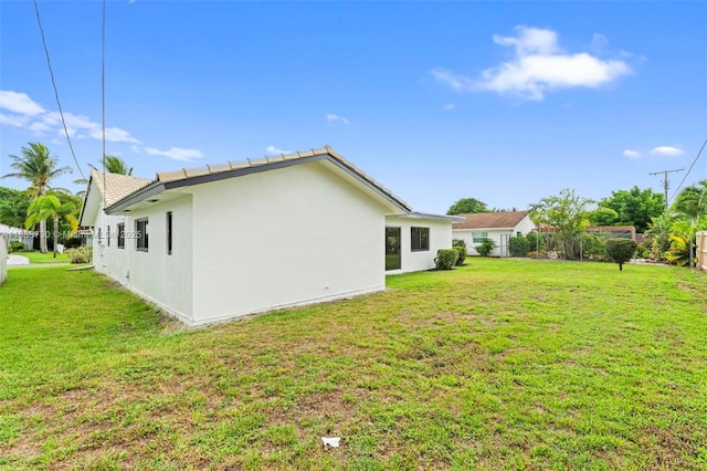 1340 SW 27th Pl, Boynton Beach, FL 33426 - back of house featuring stucco siding