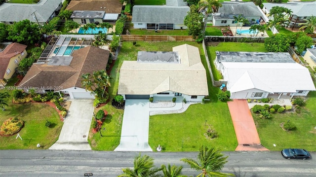 1340 SW 27th Pl, Boynton Beach, FL 33426 - aerial view of residential area featuring a pool area