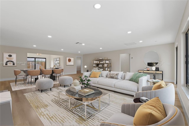1340 SW 27th Pl, Boynton Beach, FL 33426 - living room with wood finished floors and recessed lighting