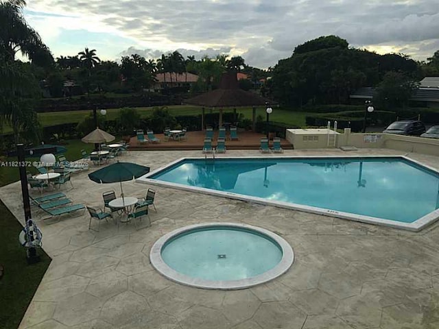 7900 Camino Crk Unit 401, Miami, FL 33143 - community pool featuring a patio and a gazebo