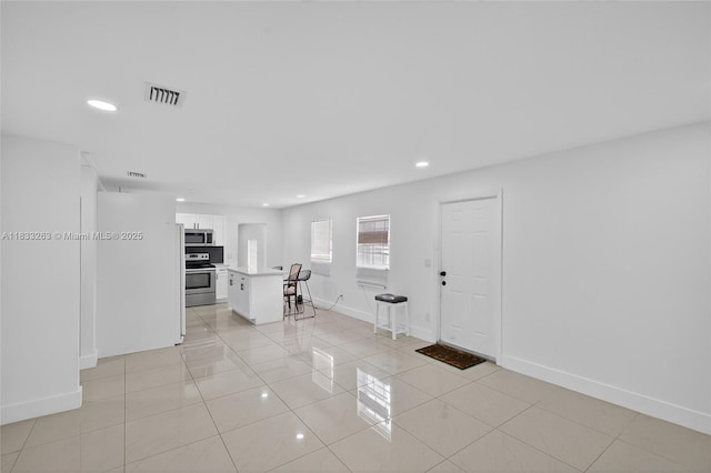 8224 NW 1st Pl, Miami, FL 33150 - foyer featuring light tile patterned floors and recessed lighting