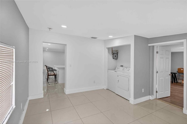 8224 NW 1st Pl, Miami, FL 33150 - unfurnished room featuring washing machine and clothes dryer, light tile patterned floors, and recessed lighting