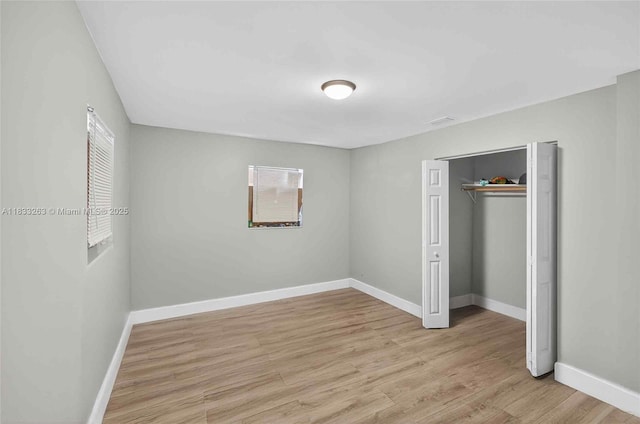 8224 NW 1st Pl, Miami, FL 33150 - unfurnished bedroom featuring light wood finished floors and a closet