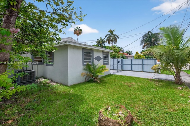 8224 NW 1st Pl, Miami, FL 33150 - view of home's exterior with stucco siding and a cooling unit
