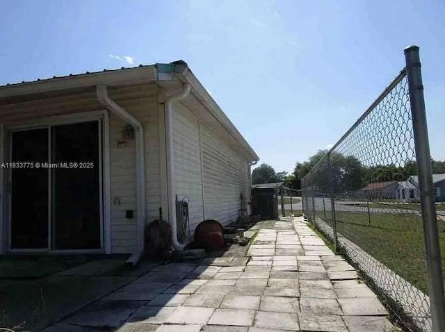 26 Sapphire Run, Ocala, FL 34472 - view of side of property with a patio