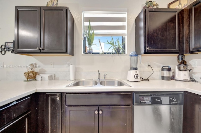 3777 SE 1st St, Homestead, FL 33033 - kitchen featuring dishwasher, dark brown cabinets, and light countertops