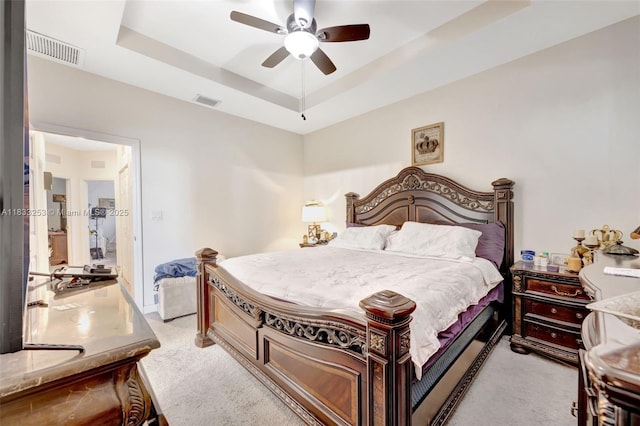 3777 SE 1st St, Homestead, FL 33033 - bedroom with light carpet, a raised ceiling, and ceiling fan