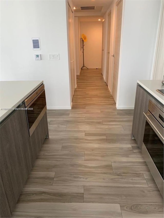 801 S Miami Ave Unit 2609, Miami, FL 33130 - corridor featuring light wood-type flooring and baseboards