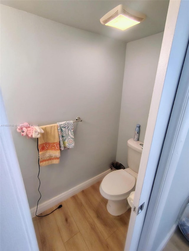 3716 NE 168th St Unit 303, North Miami Beach, FL 33160 - bathroom with wood finished floors and toilet
