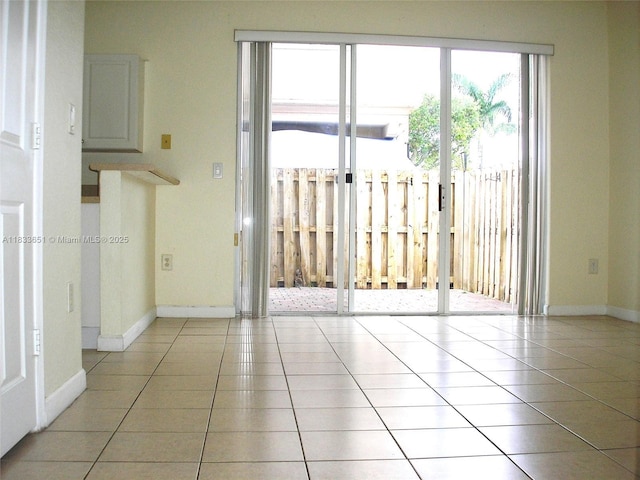 12846 SW 135th St, Miami, FL 33186 - unfurnished room featuring light tile patterned flooring and baseboards