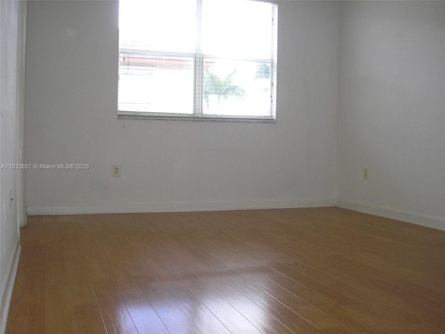 12846 SW 135th St, Miami, FL 33186 - empty room with wood finished floors