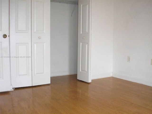 12846 SW 135th St, Miami, FL 33186 - unfurnished bedroom featuring wood finished floors and baseboards